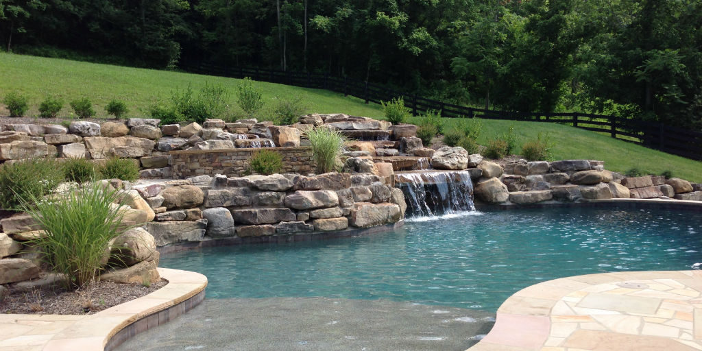 Stone pond with waterfall feature